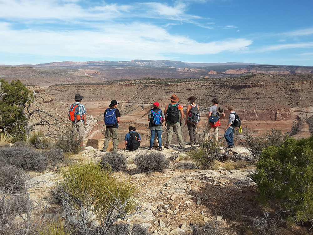 Brock and assistants enjoying the view from near a field site.